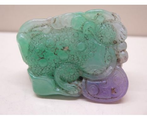 A jade carving, 6cm x 7cm, in good condition 