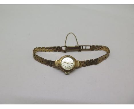 A ladies 9ct gold Roamer bracelet manual wind wristwatch, 15mm wide, approx total weight 13.6 grams, not running, condition r