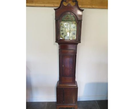 A 19th century 30 hour longcase clock with a painted 12inch arched dial in an oak case - Height 85 inches 