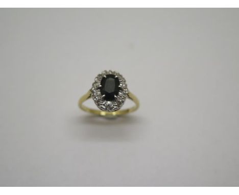 An 18ct gold sapphire and diamond ring, marked 18ct, ring size O, head approx 11mm x13mm, some wear but generally good 