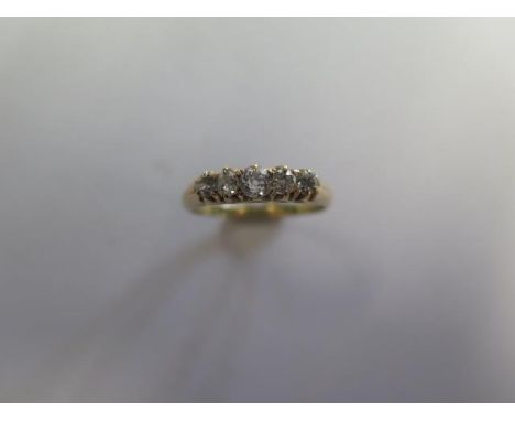 A yellow gold five stone diamond ring, tests to above 9ct, ring size Q, approx 2.3 grams, diamonds are bright and generally g