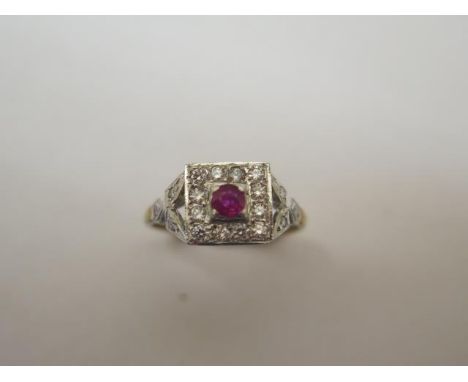 A ruby and diamond hallmarked 9ct yellow gold ring, size O/P, head approx 9mm x 8mm, approx 3 grams, in good condition 
