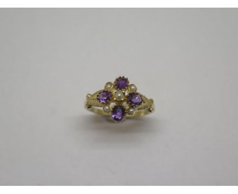 A hallmarked 9ct yellow gold pearl and amethyst cluster ring, size N/O, approx 2.9 grams, in good condition