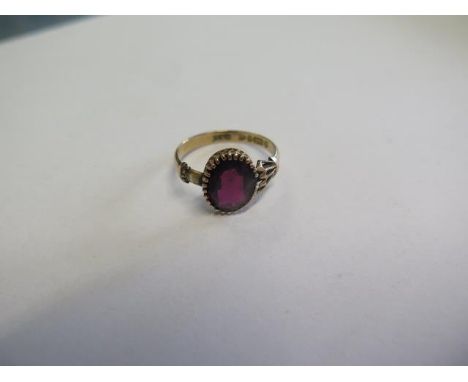 A hallmarked 9ct ring, size J/K, approx weight 2.2 grams, some wear and missing a claw 
