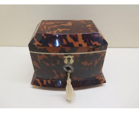 A bone and tortoiseshell two section tea caddy, 12cm tall x 15cm x 11cm, with a key in good condition 