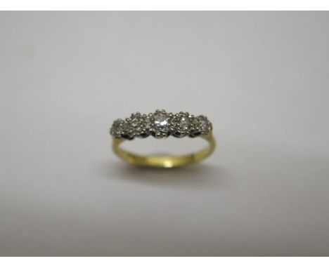 A hallmarked 18ct gold five stone illusion set diamond ring, size M, approx 2.9 grams, generally good some small wear 