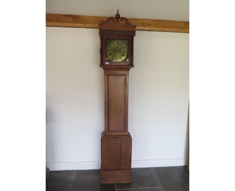 An 18th century oak 30 hour longcase clock with a birdcage movement and a 11 inch square brass dial, signed John Pollard Cred