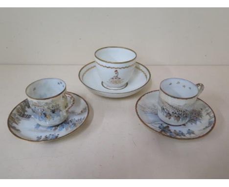 A fine pair of Japanese eggshell porcelain cups and saucers, well decorated with warriors, the cup base with a red and gold d