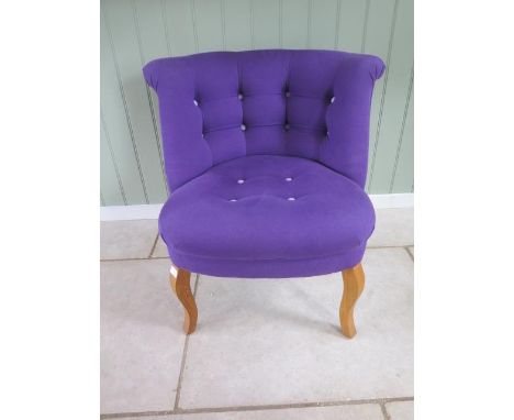 A Oliver Bonas of Cambridge button back single tub chair in purple, 73cm tall x 70cm wide, seat height 43cm, in good conditio