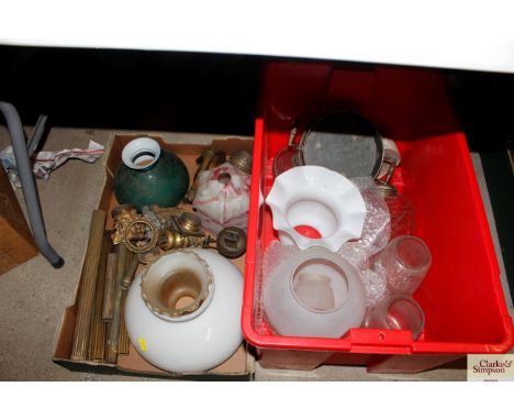 Two boxes containing various lamp globes shades and various spares