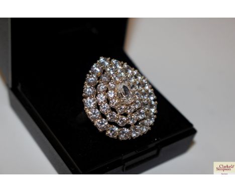 A Diamonique silver and cubic zirconia cocktail ring, size T/U, total weight approximately 8g