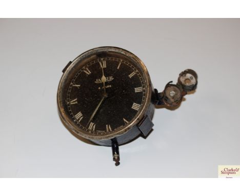A vintage Jaeger car clock
