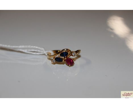 A blue, red and white stone set ring marked 18k, total weight approx. 3.7g