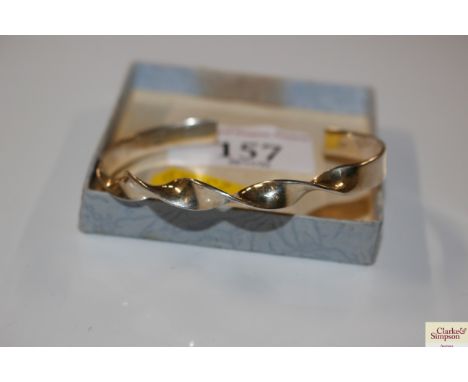 A sterling silver twist front torch bangle, weight approx. 15g