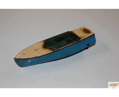 A Hornby Racer One clockwork tin plate boat, lacking key AF
