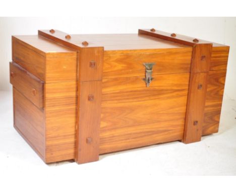 A mid 20th Century South African oak trunk / chest. With medieval style decoration. Of rectangular form with with metal hinge