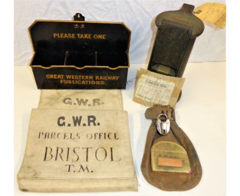 A Lot containing Railway Station items. Canvas cash bag complete with GWR stamped lock. Edmondson Ticket dating press (no typ