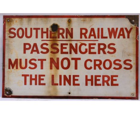 Southern Railway enamel sign. PASSENGERS MUST NOT CROSS THE LINE HERE. Some rusting stains. Measures 26in x 16in.