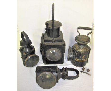 4 x Railway lamps to include BR(W) brake van lamp minus vessel. BR(M) Handlamp. BR Handlamp. LNER GE style Handlamp requiring