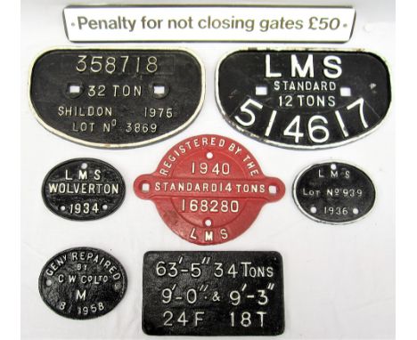 A lot containing cast iron Wagon and registration Plates. D plate 358718 32 T Shildon. D Plate LMS 12 T 514617. Oval LMS WOLV