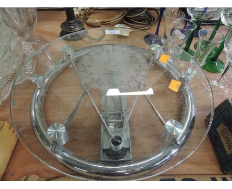 A glass weighing scale set Premier made