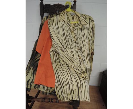 Small selection of vintage and retro blouses, mixed sizes and styles.