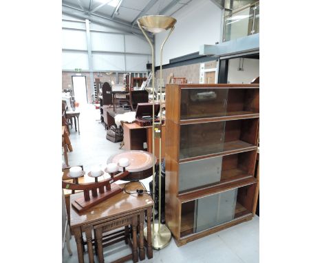A modern brass style standard lamp