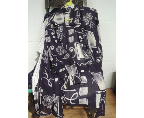 Small selection of vintage and retro blouses, mixed sizes and styles.