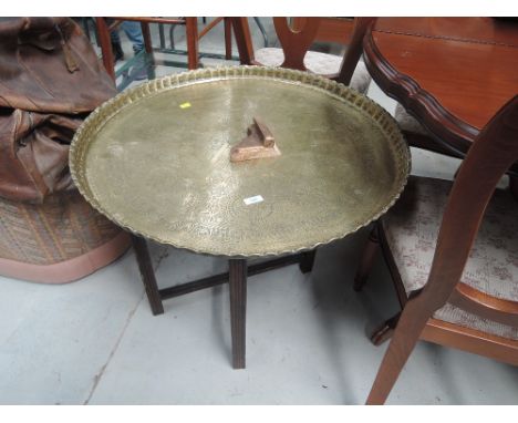 A brass topped campaign table 