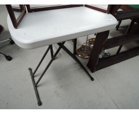 A fold away plastic table