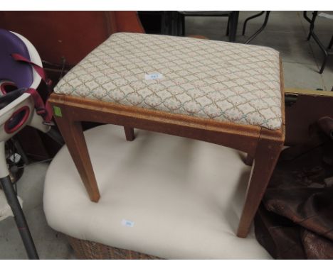 A vintage dressing table stool