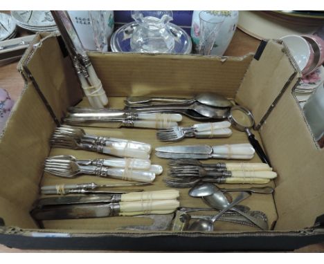 A selection of flatware and table cutlery with mother of pearl style handles HM silver fruit knifes and forks