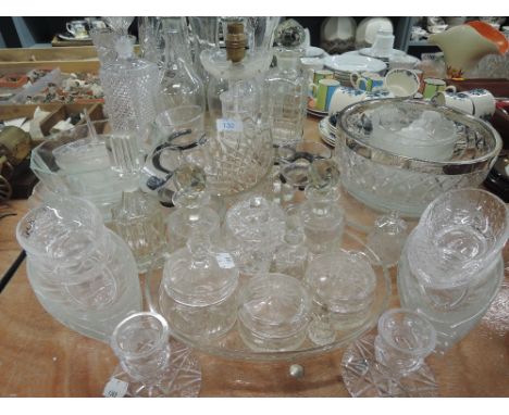 A selection of crystal cut glass wares including table lamp