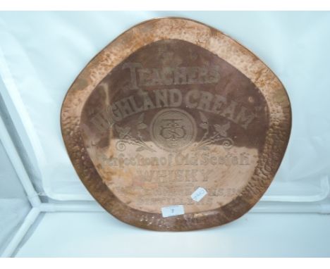 A vintage copper advertising tray for Teachers Irish cream Whisky