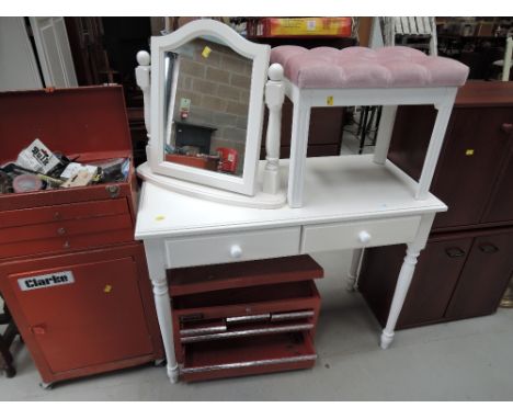 A laminate dressing table and stool set