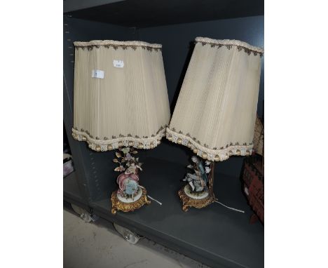 A pair of figural lamp bases