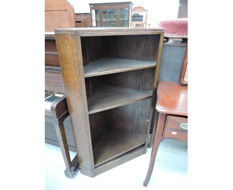 An early 20th Century oak corner shelf