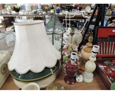 A selection of table lamps including oriental figure