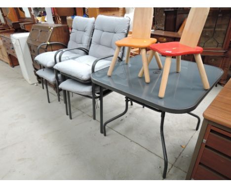 A modern garden set of table and 4 chairs