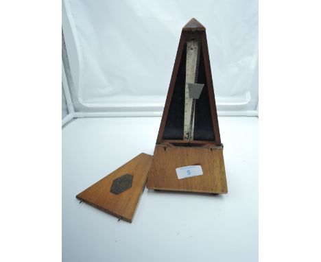 A vintage musical metronome by Maelzel