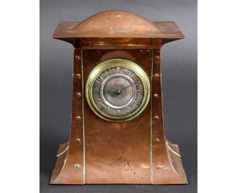 ARTS & CRAFTS MANTLE CLOCK with a pewter dial and hand beaten copper case with dome top. Unmarked, Dial 5.5cms diameter, Cloc