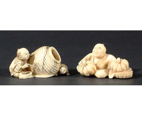 JAPANESE IVORY NETSUKE, carved as a man and boy painting a large vase, 5cm; and another as a man selling pumpkins, 5cm (2)