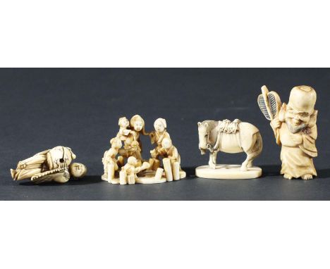 JAPANESE IVORY OKIMONO, carved as a standing horse, three character signature, 3.8cm; a group of children playing in a river,