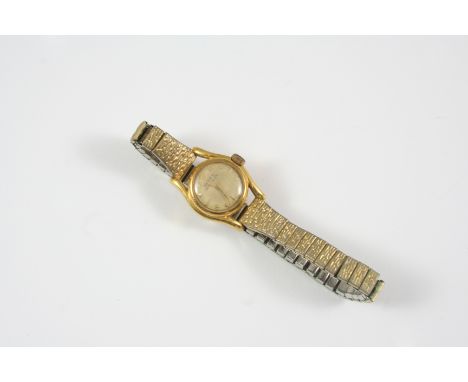 A LADY'S GOLD WRISTWATCH BY ROLEX the signed circular dial with star and dagger numerals, on a gold plated and stainless stee