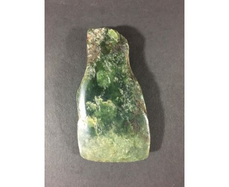 CHINESE GREEN ARCHAISTIC JADE AXE HEAD, possibly Warring States, 8cm x 4.5cm
