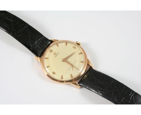 A GENTLEMAN'S 18CT. ROSE GOLD MECHANICAL OVERSIZED WRISTWATCH BY OMEGA the signed circular dial with Arabic and dagger numera