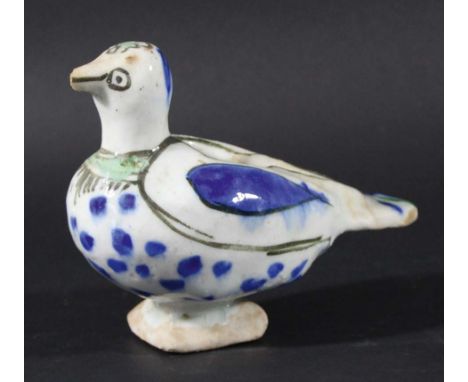 IZNIK STYLE FIGURE OF A PIGEON, probably Turkish and possibly an oil lamp or ink well, with blue, green and black decoration,