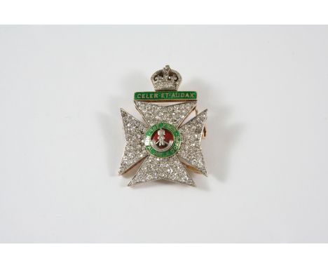 A DIAMOND AND ENAMEL REGIMENTAL BROOCH FOR THE KING'S ROYAL RIFLE CORPS. millegrain set with circular-cut diamonds and with g