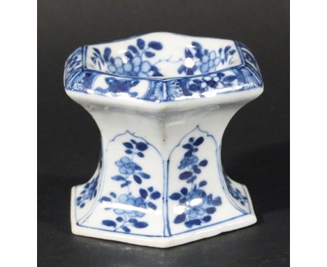 CHINESE BLUE AND WHITE SALT, Kangxi style, of waisted hexagonal form, painted with floral lappets, height 7cm, width 9cm