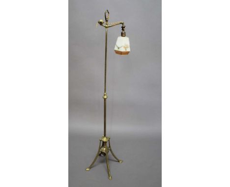 ARTS & CRAFTS BRASS STANDARD LAMP in the manner of W.A.S Benson, with a fluted column and splayed heart shaped feet. Of adjus